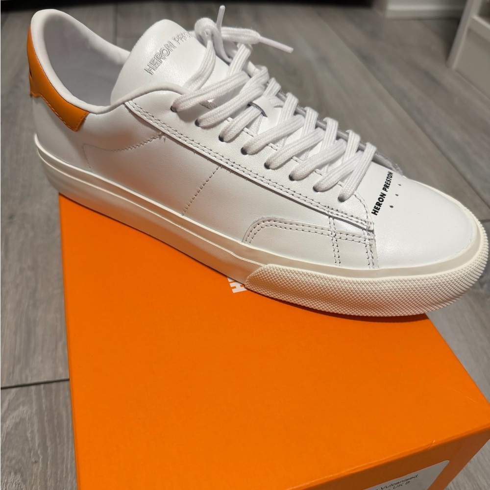 Heron Preston Vulcanized Low Top sneakers in white and orange
